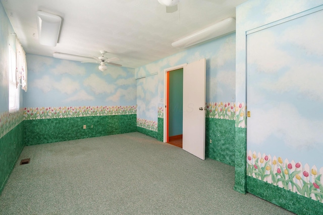 5308 Sharon Ave, Columbus, OH 43214 - carpeted empty room featuring ceiling fan and wallpapered walls