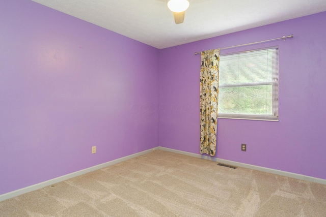 5308 Sharon Ave, Columbus, OH 43214 - carpeted spare room with baseboards and a ceiling fan