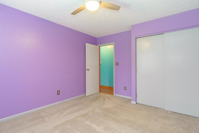 5308 Sharon Ave, Columbus, OH 43214 - unfurnished bedroom with carpet floors, ceiling fan, a closet, and baseboards