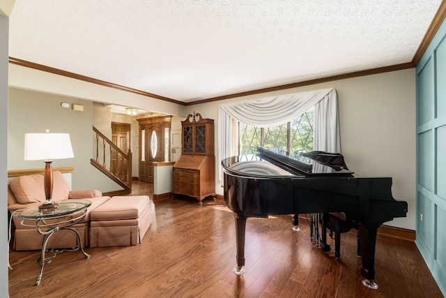 12385 Woodsfield Cir E, Pickerington, OH 43147 - sitting room with ornamental molding, wood finished floors, and stairway