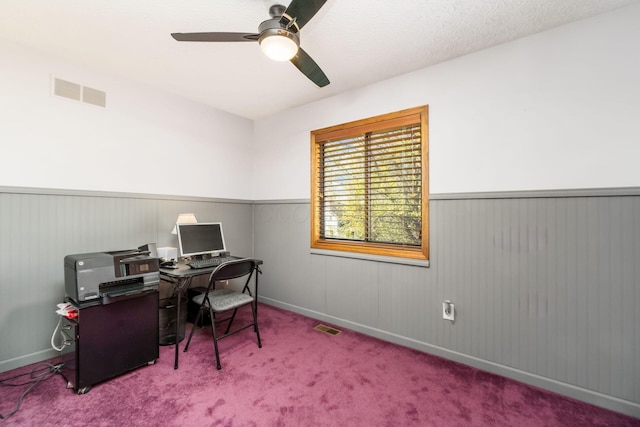 12385 Woodsfield Cir E, Pickerington, OH 43147 - carpeted home office featuring visible vents, a ceiling fan, and wainscoting