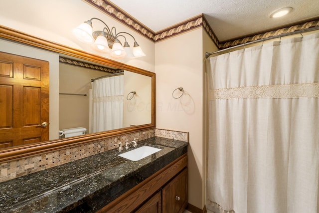 12385 Woodsfield Cir E, Pickerington, OH 43147 - bathroom featuring vanity, toilet, curtained shower, and tasteful backsplash