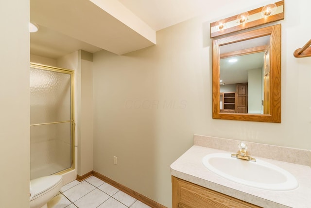 12385 Woodsfield Cir E, Pickerington, OH 43147 - bathroom featuring vanity, tile patterned flooring, a shower with door, and toilet