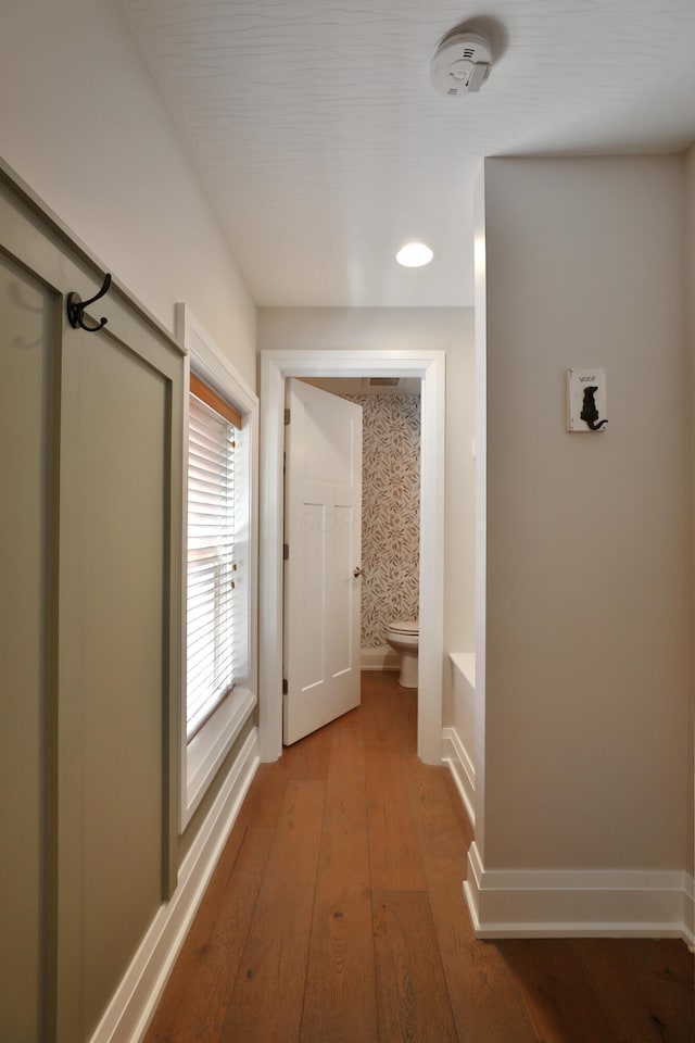 1012 Ewing Aly, Columbus, OH 43201 - hallway with baseboards and hardwood / wood-style floors