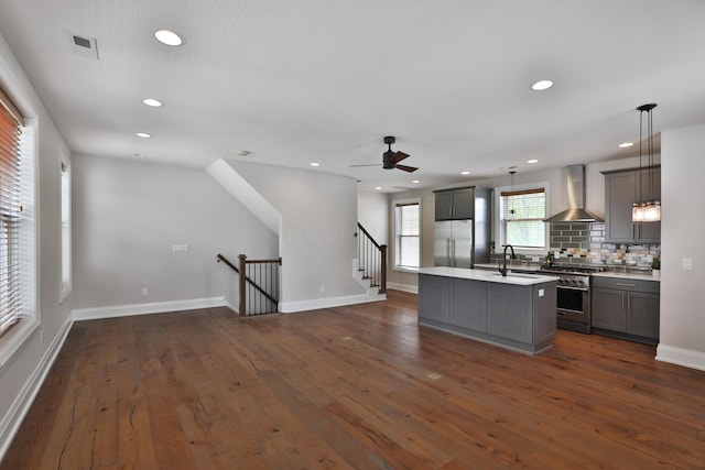 1012 Ewing Aly, Columbus, OH 43201 - kitchen featuring wall chimney range hood, recessed lighting, and high end appliances