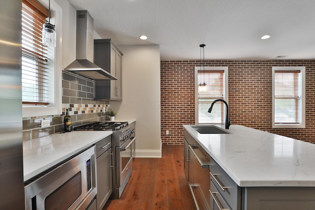 1012 Ewing Aly, Columbus, OH 43201 - kitchen featuring dark wood-style flooring, appliances with stainless steel finishes, a sink, wall chimney exhaust hood, and gray cabinetry