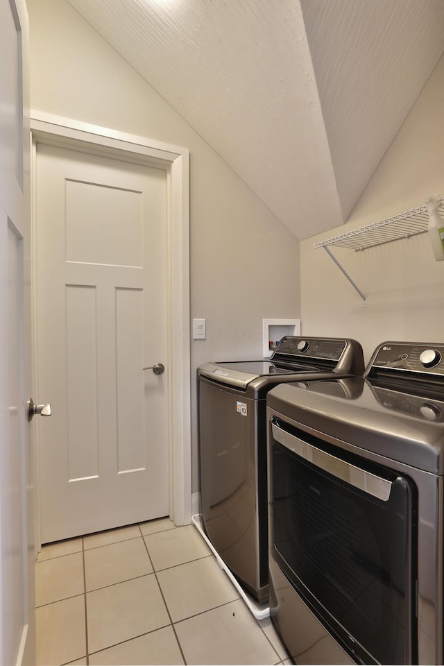1012 Ewing Aly, Columbus, OH 43201 - laundry area featuring laundry area, independent washer and dryer, and light tile patterned floors