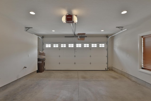 1012 Ewing Aly, Columbus, OH 43201 - garage featuring recessed lighting and a garage door opener