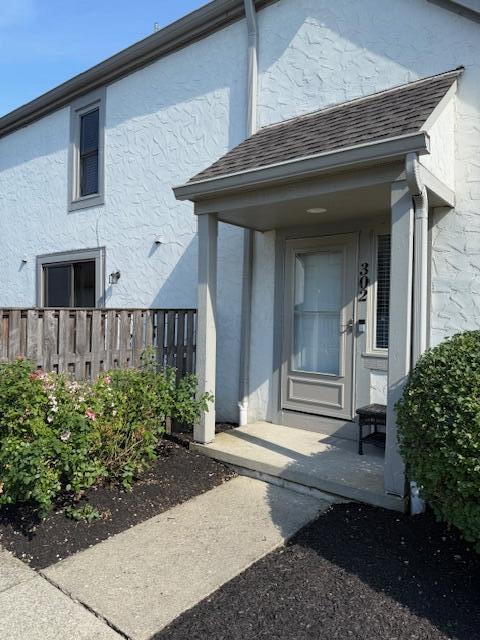 302 Saint Andrews Dr Unit 302, Dublin, OH 43017 - entrance to property featuring stucco siding