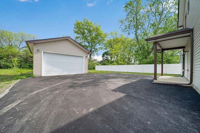 detached garage with fence