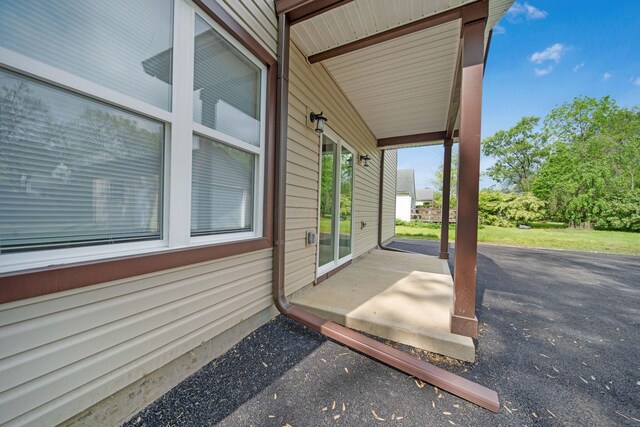 view of patio featuring a porch