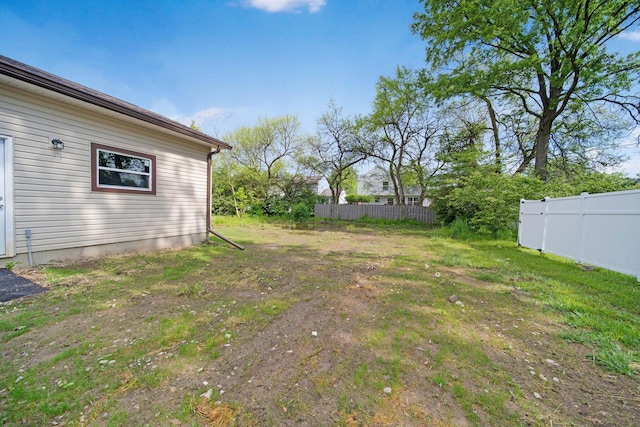 view of yard featuring fence