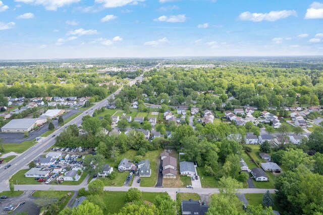 aerial overview of property's location featuring nearby suburban area