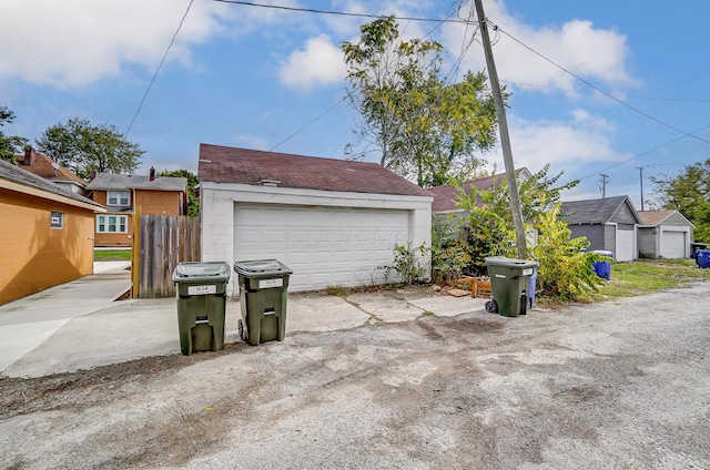 detached garage with fence