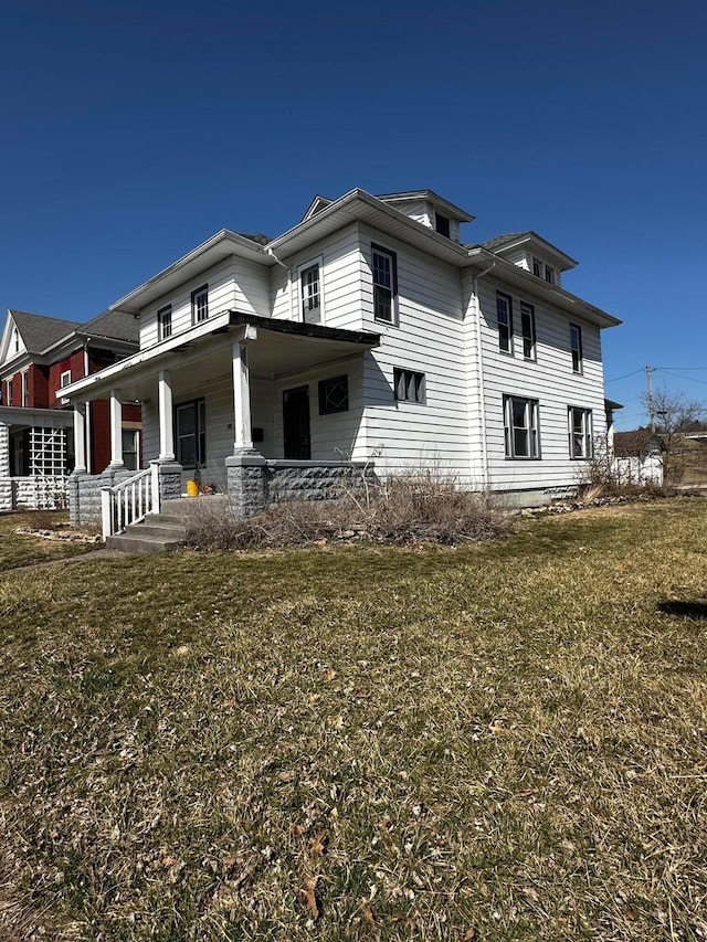 406 W Church St, Newark, OH 43055 - view of property exterior with a porch and a yard
