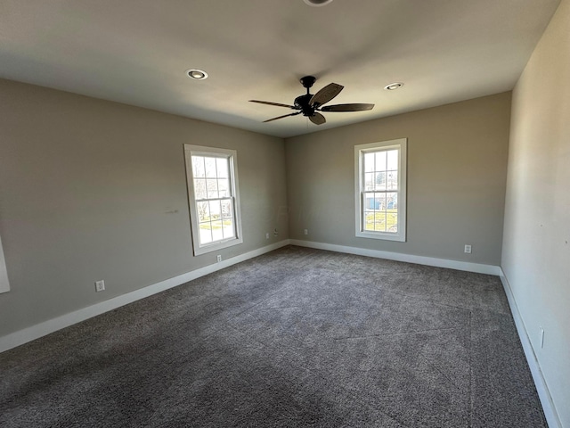 406 W Church St, Newark, OH 43055 - spare room with recessed lighting, baseboards, ceiling fan, and dark carpet