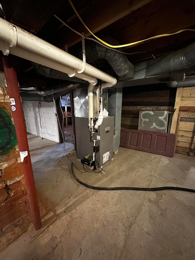 406 W Church St, Newark, OH 43055 - unfinished basement featuring heating unit