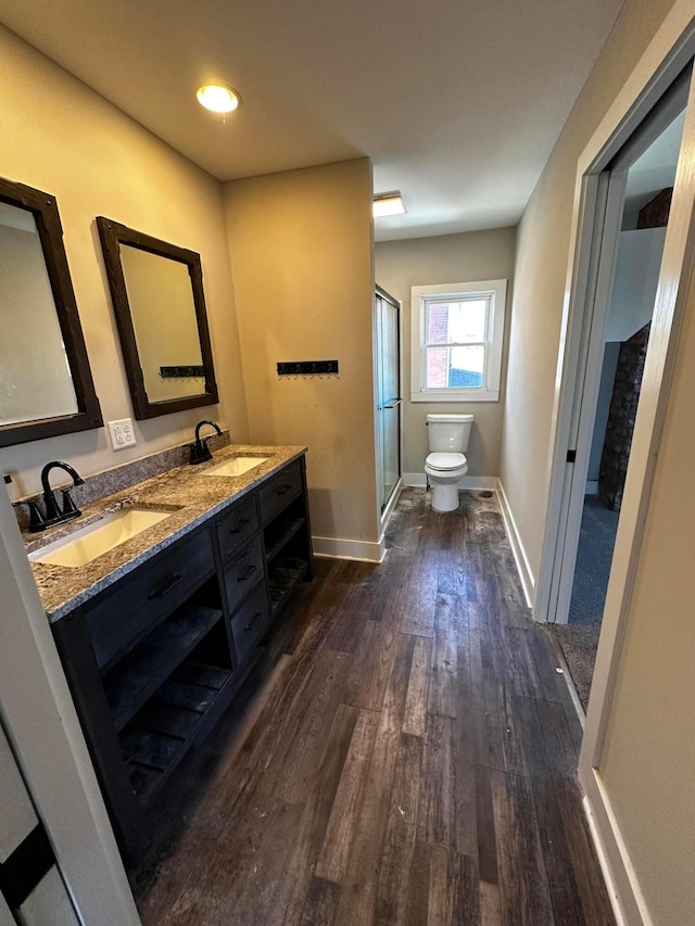 406 W Church St, Newark, OH 43055 - full bath featuring wood-type flooring, a sink, toilet, and a shower stall