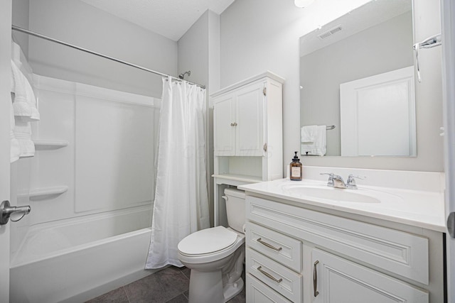 full bath with visible vents, shower / bath combo with shower curtain, vanity, toilet, and tile patterned floors