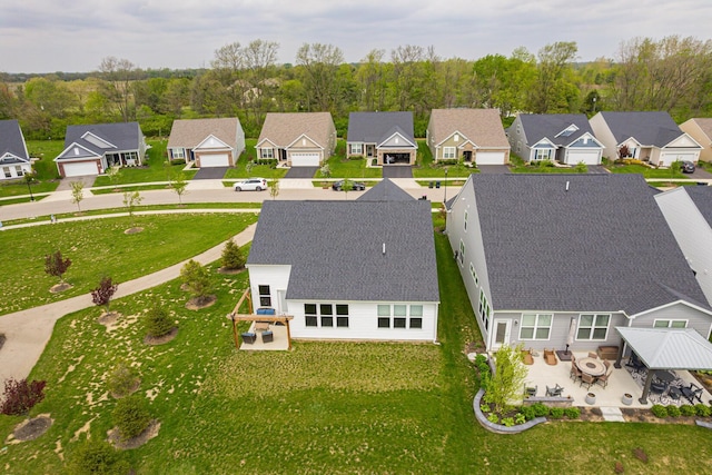 drone / aerial view with a residential view
