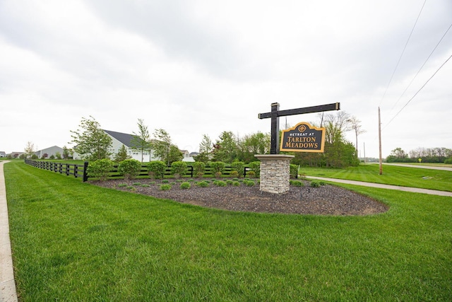 community sign with a yard