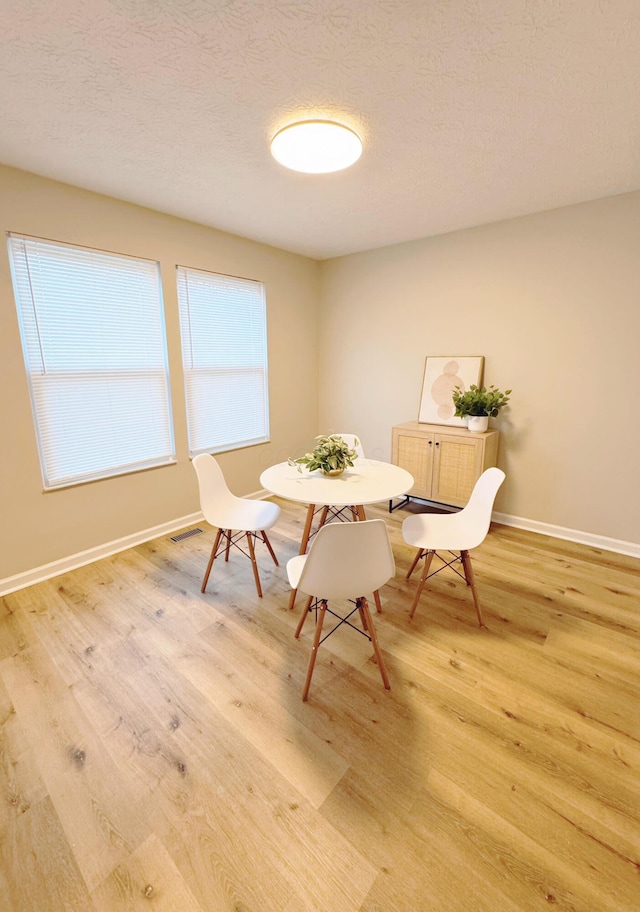 2462 Sanford Dr, Columbus, OH 43235 - dining area featuring baseboards and light wood-type flooring