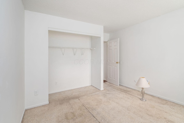 6556 Centennial Dr, Reynoldsburg, OH 43068 - unfurnished bedroom featuring baseboards, carpet flooring, and a closet