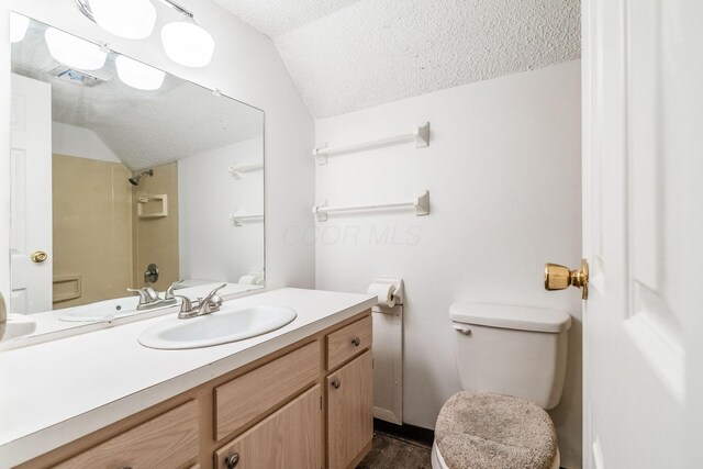 6556 Centennial Dr, Reynoldsburg, OH 43068 - bathroom featuring toilet, a textured ceiling, visible vents, lofted ceiling, and vanity