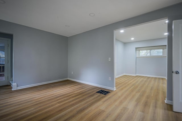 2513 Georgetown Ave, Toledo, OH 43613 - empty room featuring recessed lighting, baseboards, visible vents, and wood finished floors
