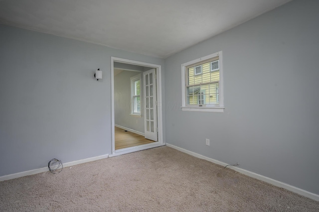 2513 Georgetown Ave, Toledo, OH 43613 - spare room featuring carpet floors and baseboards