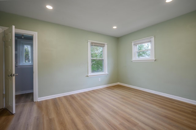 2513 Georgetown Ave, Toledo, OH 43613 - unfurnished room with baseboards, recessed lighting, and light wood-style flooring