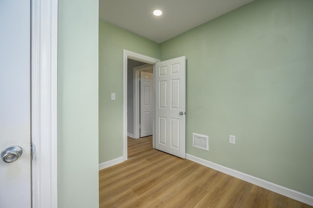 2513 Georgetown Ave, Toledo, OH 43613 - empty room featuring visible vents, baseboards, and light wood-style floors