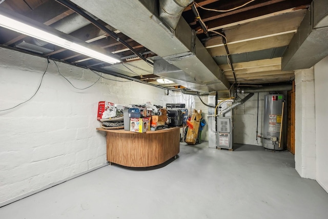 unfinished basement with heating unit and gas water heater