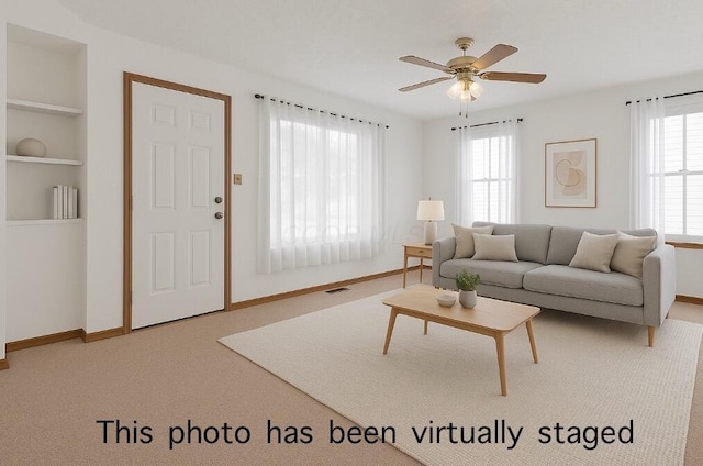 119 Highland Ave, Circleville, OH 43113 - living area featuring plenty of natural light, a ceiling fan, and built in features