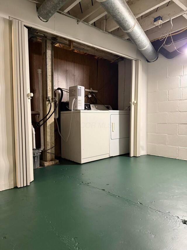 119 Highland Ave, Circleville, OH 43113 - unfinished basement featuring washing machine and clothes dryer
