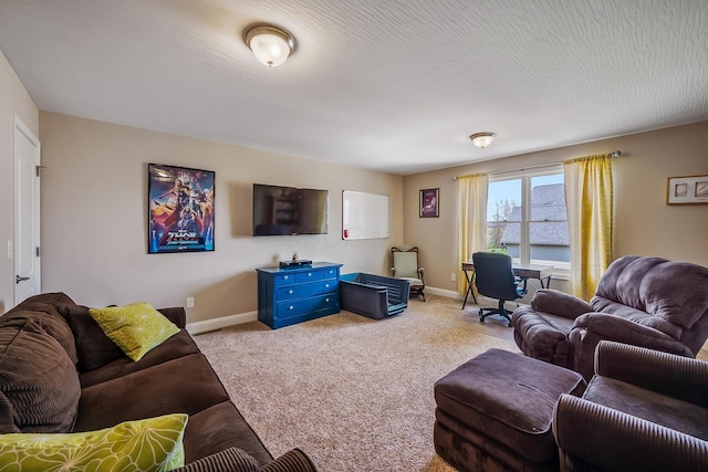living area featuring baseboards and light colored carpet