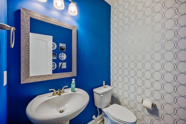 bathroom with a sink and toilet