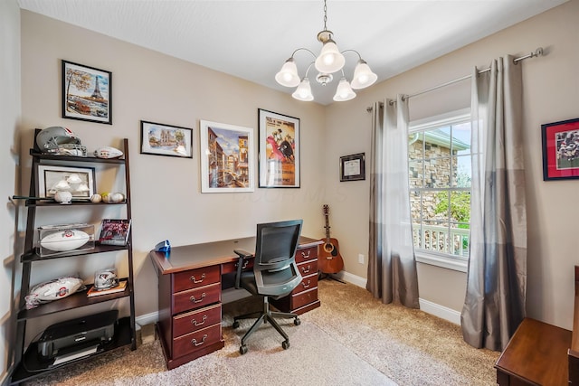 office space with baseboards, light carpet, and a notable chandelier
