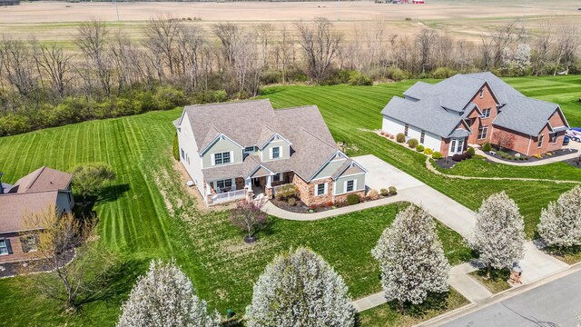 birds eye view of property featuring a rural view