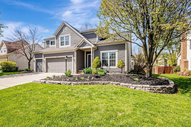 3622 Boathouse Dr, Hilliard, OH 43026 - view of front of property with fence, driveway, a front yard, and a garage