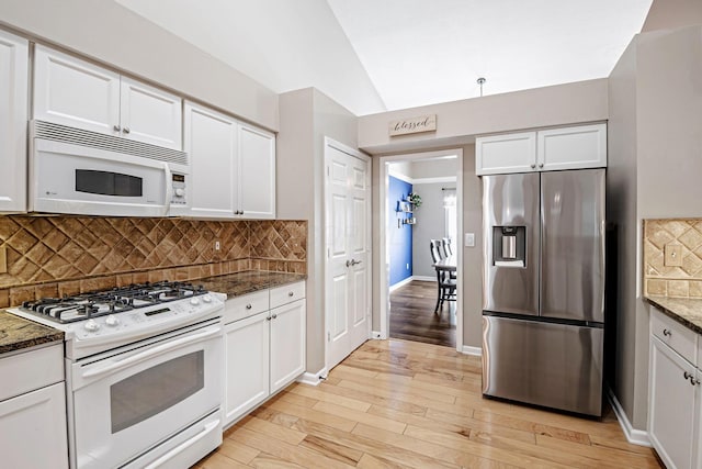 3622 Boathouse Dr, Hilliard, OH 43026 - kitchen featuring white appliances, white cabinetry, and dark stone counters