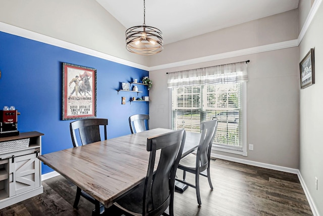 3622 Boathouse Dr, Hilliard, OH 43026 - dining space featuring an inviting chandelier, baseboards, dark wood-style floors, and lofted ceiling