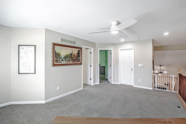 3622 Boathouse Dr, Hilliard, OH 43026 - empty room with visible vents, a ceiling fan, baseboards, and carpet