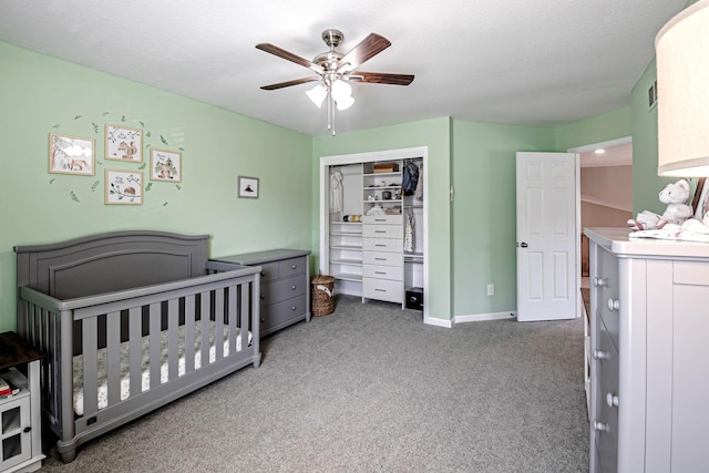 3622 Boathouse Dr, Hilliard, OH 43026 - carpeted bedroom featuring a nursery area, ceiling fan, visible vents, and a closet