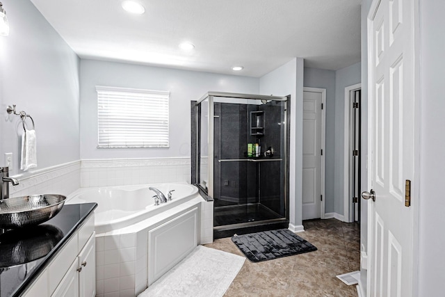 3622 Boathouse Dr, Hilliard, OH 43026 - full bathroom with a bath, visible vents, a shower stall, vanity, and recessed lighting