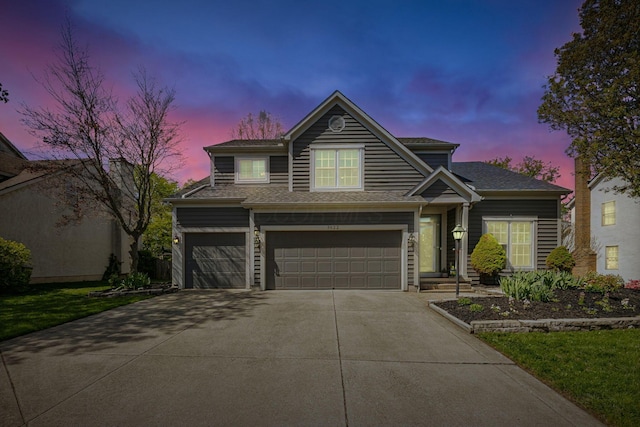 3622 Boathouse Dr, Hilliard, OH 43026 - traditional-style home with a garage, driveway, and roof with shingles