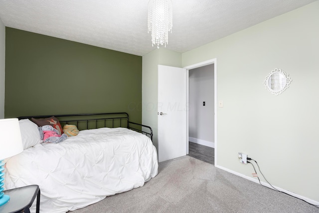 5756 Idana Ct, Westerville, OH 43081 - bedroom with a textured ceiling, baseboards, and carpet floors