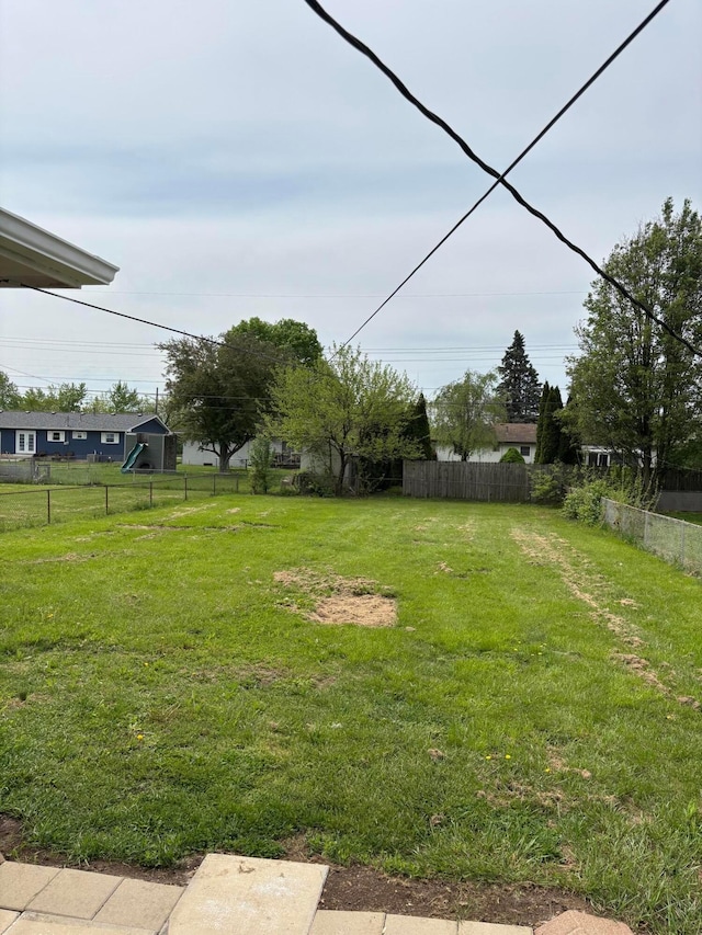 view of yard featuring fence