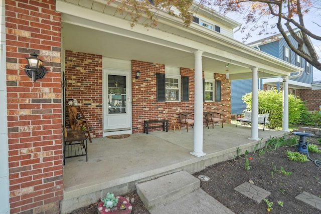 view of patio featuring a porch