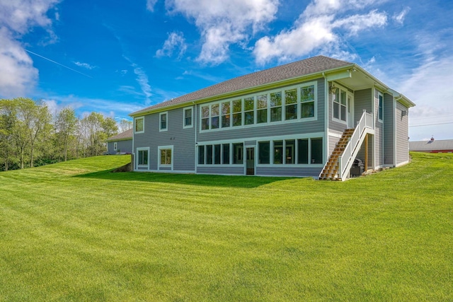 2051 River Rd, Delaware, OH 43015 - rear view of property with a yard and stairway
